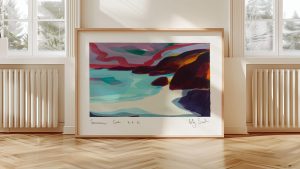 A framed abstract painting of Trevaunance Cove hanging on a light-coloured wall above a wooden herringbone floor.